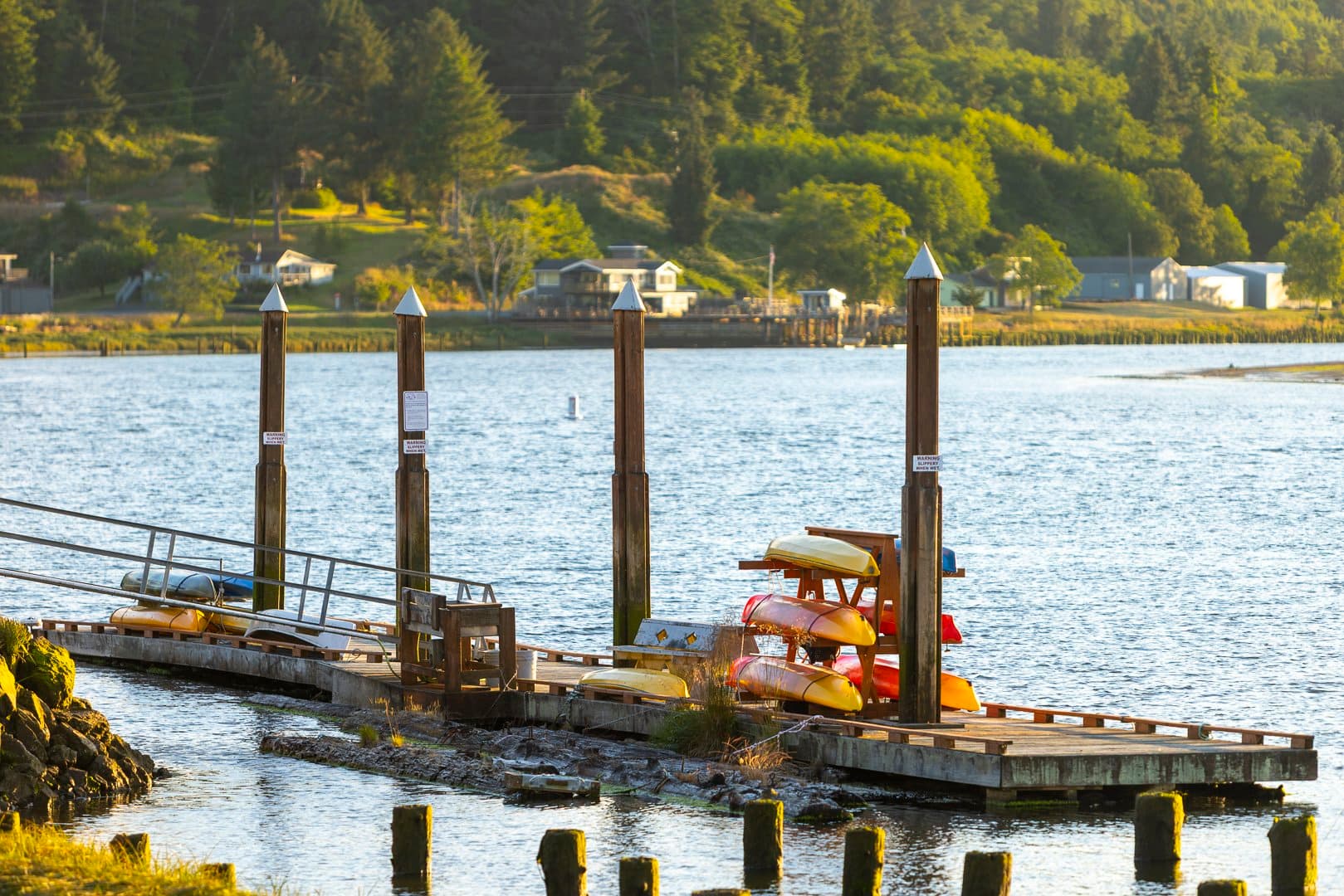 Kayaks on Nehalem Bay at sunset