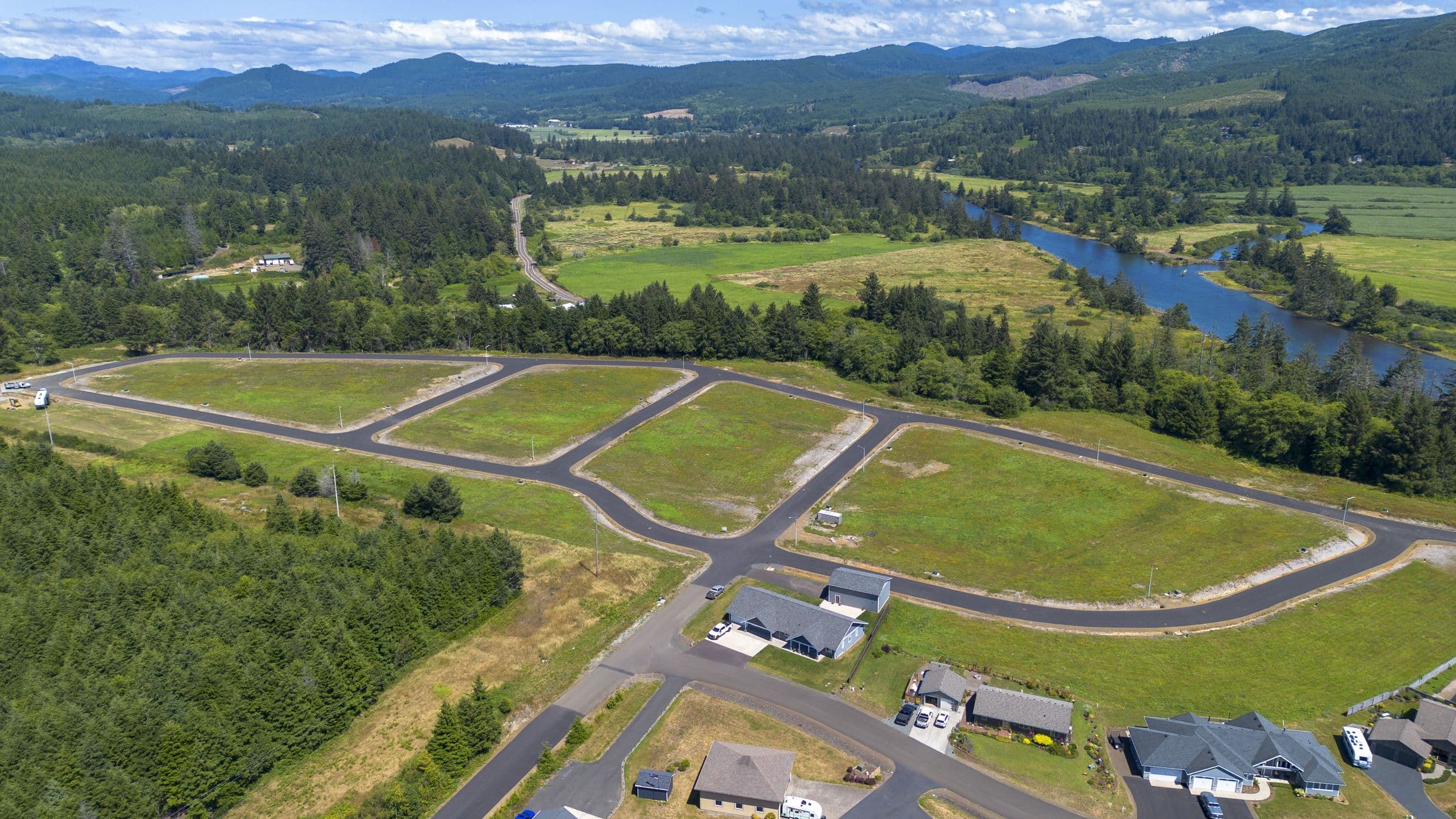 Paved streets and open lots at Riverview Meadows, from the air